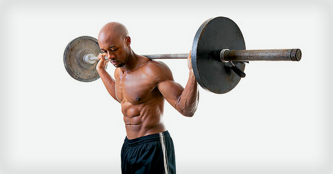 man lifting weights