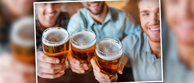 men holding glasses of alcohol beer 